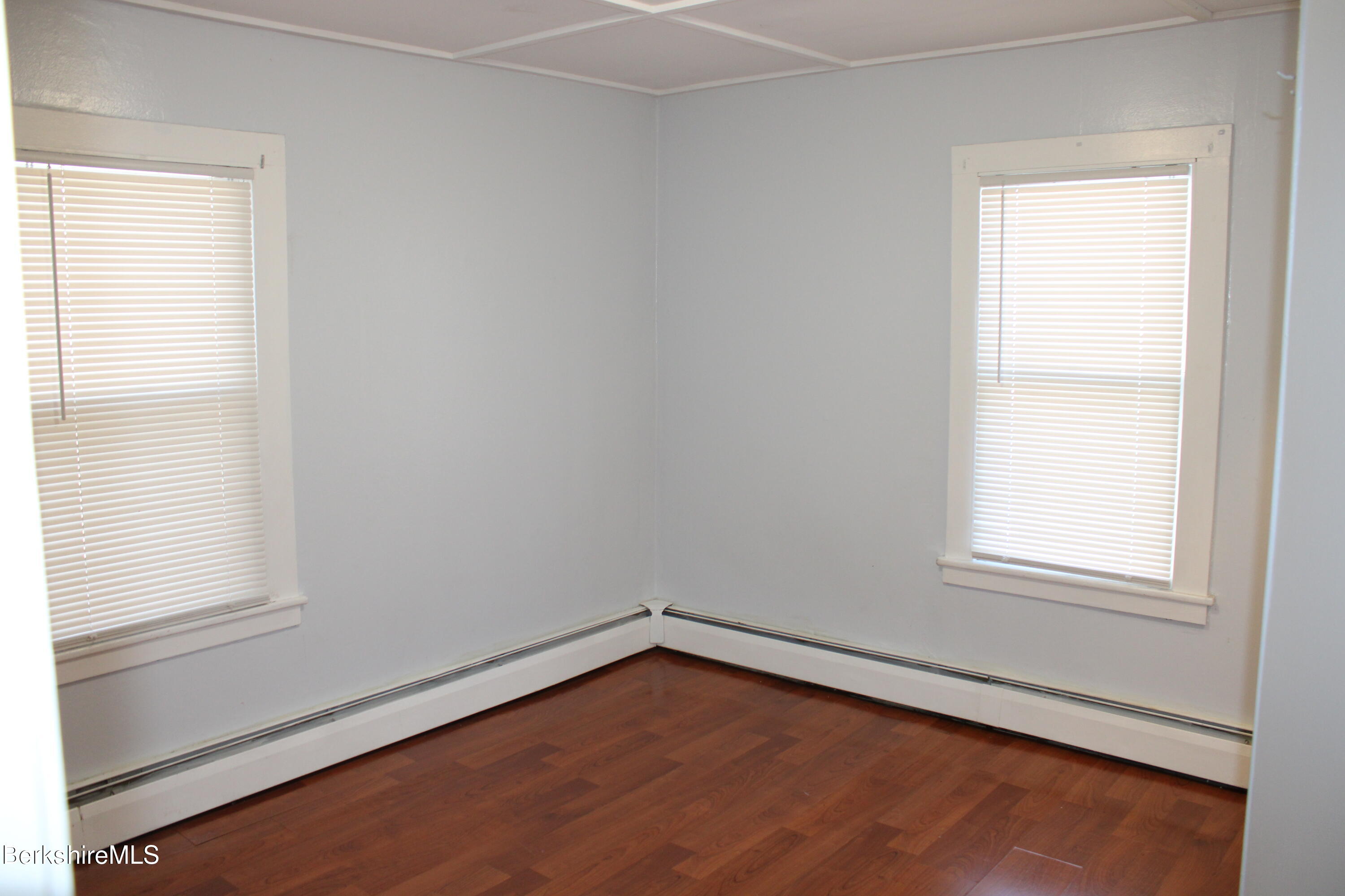 3-5 Pleasant Street Pittsfield, MA 01201 - Photo 18 of 40 an empty room with a window