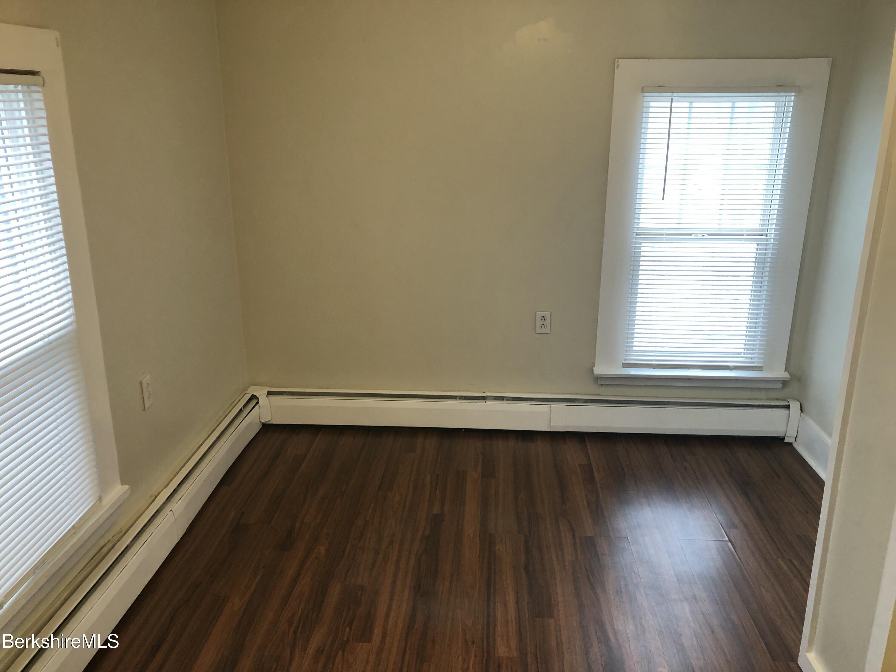 3-5 Pleasant Street Pittsfield, MA 01201 - Photo 36 of 40 a view of a room with wooden floor and window
