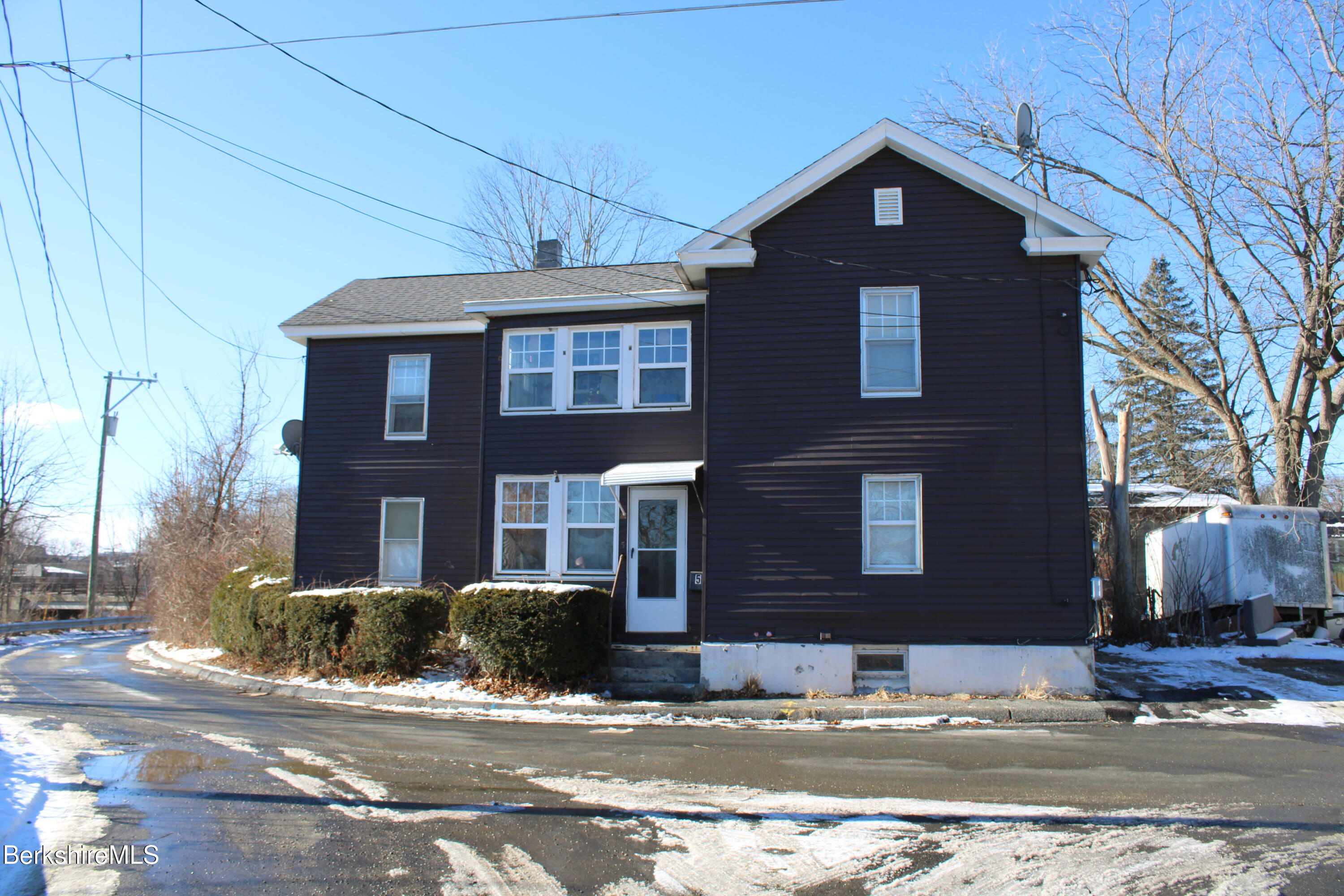 3-5 Pleasant Street Pittsfield, MA 01201 - Photo 39 of 40 a front view of a house with a yard