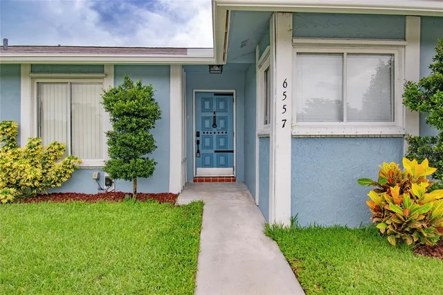 a front view of a house with a porch
