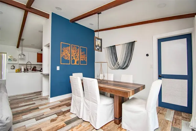 a view of a dining room with furniture