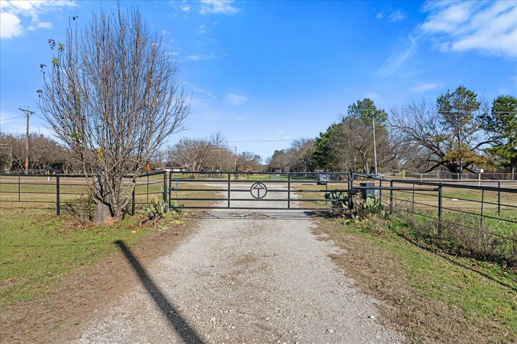 550 Fm 1389 Street South Combine, TX 75159 - Photo 8 of 36 a view of a yard with wooden fence