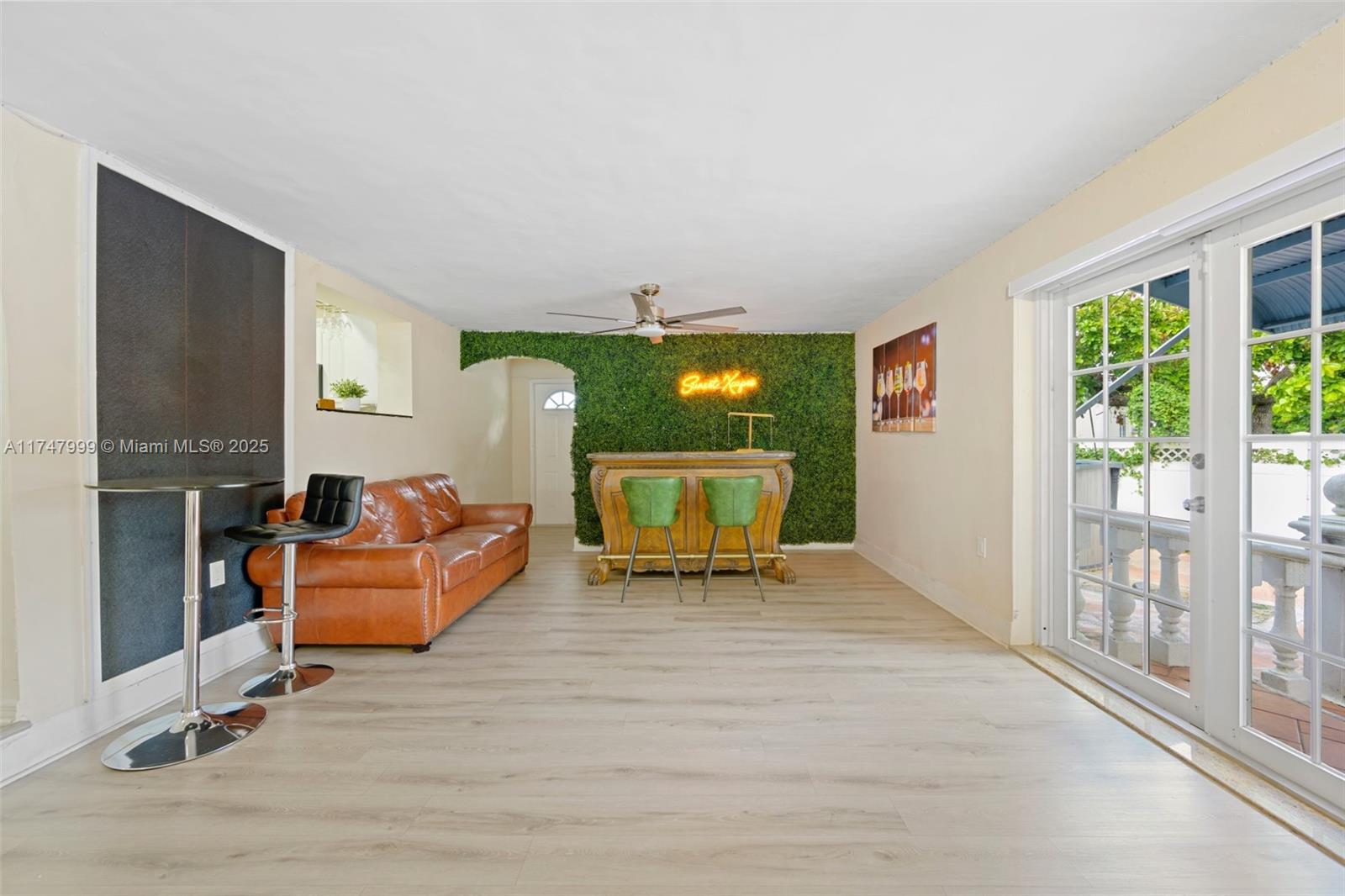 951 Northwest 148th Street Miami, FL 33168 - Photo 16 of 36 a living room with furniture window and flat screen tv
