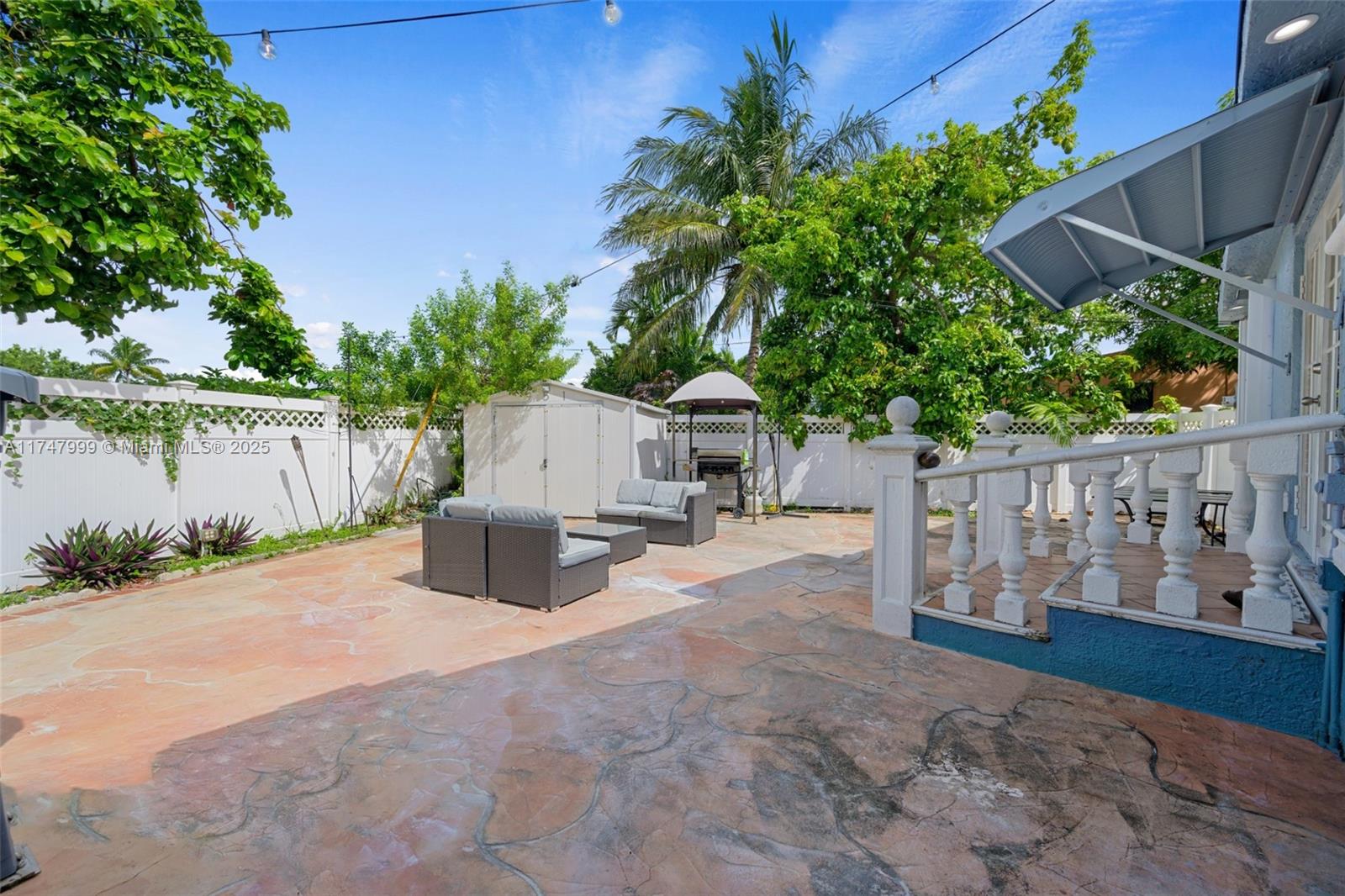 951 Northwest 148th Street Miami, FL 33168 - Photo 30 of 36 a wooden bench sitting in front of a house