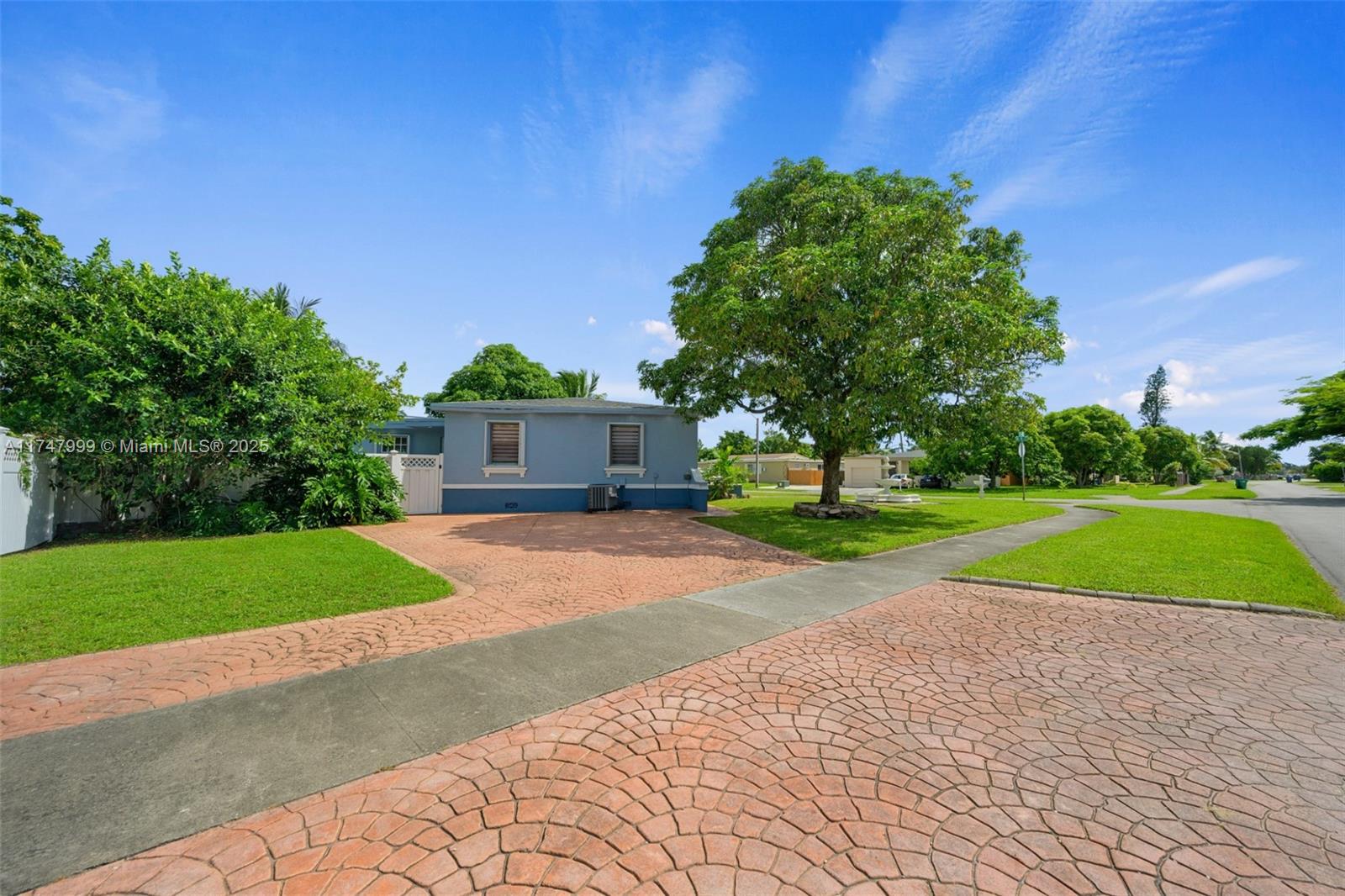 951 Northwest 148th Street Miami, FL 33168 - Photo 32 of 36 a view of a house with a big yard
