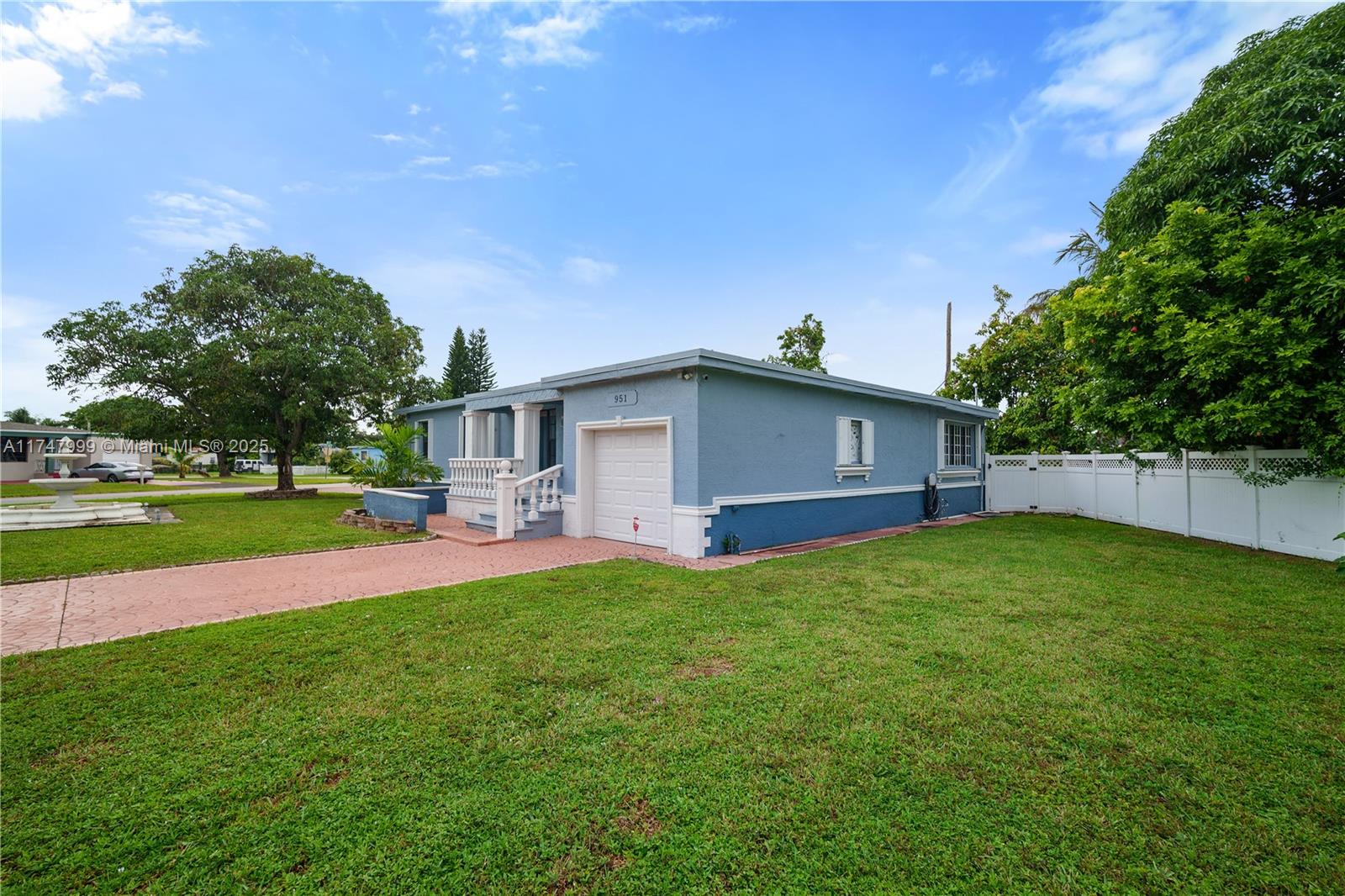 951 Northwest 148th Street Miami, FL 33168 - Photo 33 of 36 a view of a backyard with a garden
