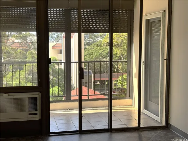 a view of an empty room and window
