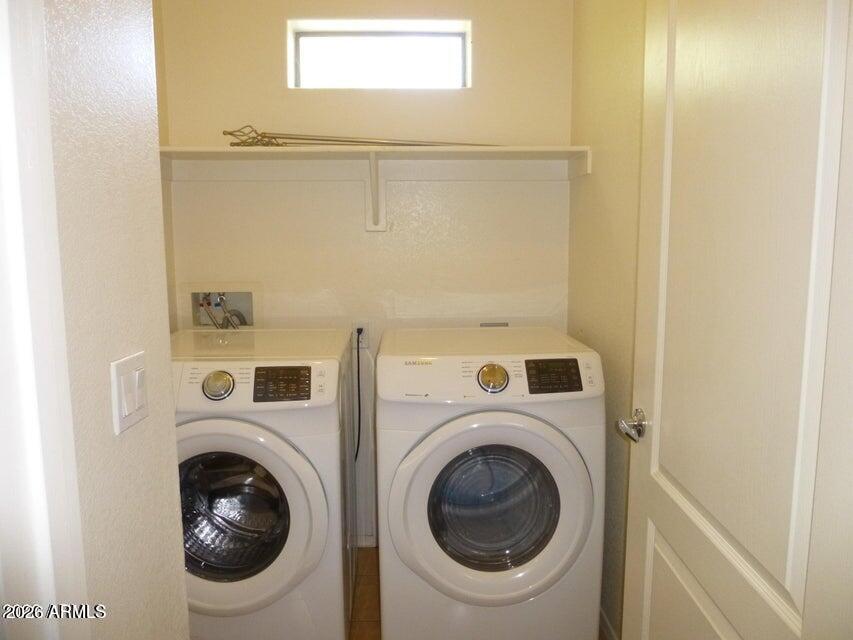 2727 North Price Road, Unit 28 Chandler, AZ 85224 - Photo 9 of 14 a utility room with dryer and washer