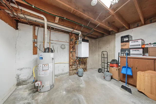 a big room with furniture and a flat screen tv