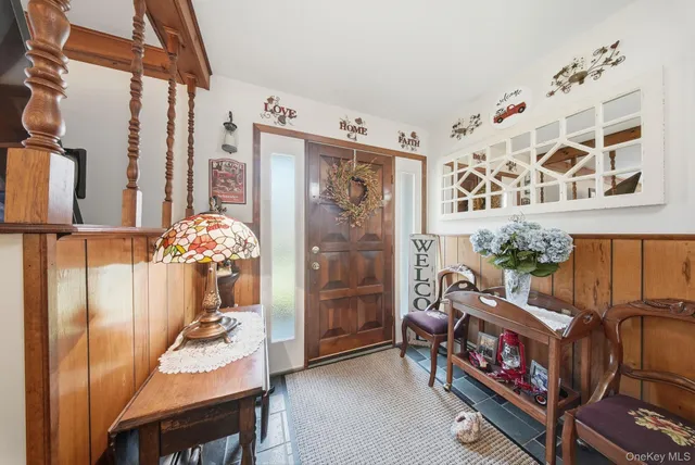 a view of a entryway with furniture and toys