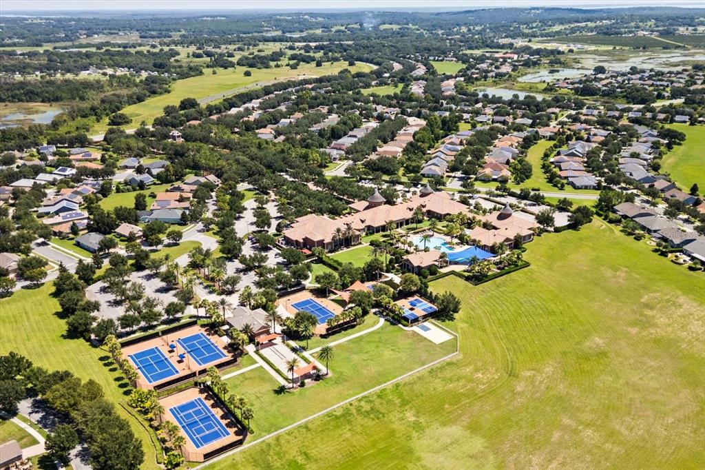 100 Silver Maple Road Groveland, FL 34736 - Photo 30 of 54 an aerial view of residential houses with outdoor space