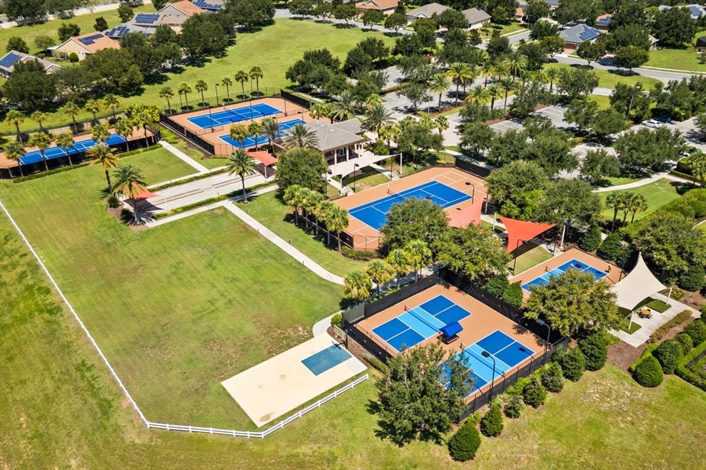 100 Silver Maple Road Groveland, FL 34736 - Photo 37 of 54 an aerial view of residential house with outdoor space and swimming pool