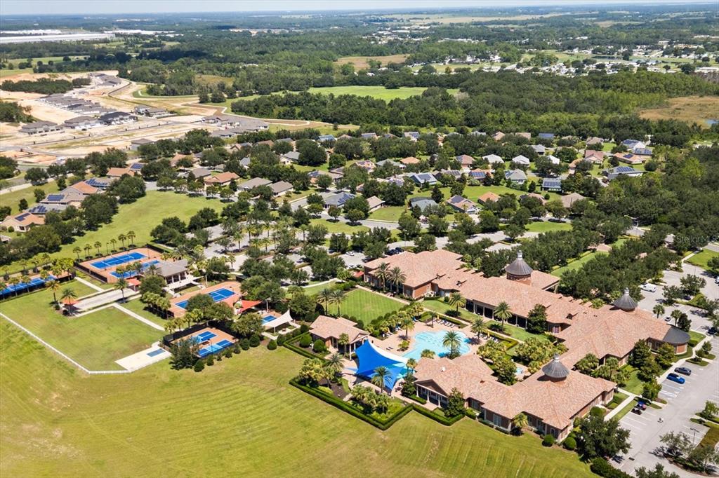 100 Silver Maple Road Groveland, FL 34736 - Photo 40 of 54 an aerial view of residential houses with outdoor space