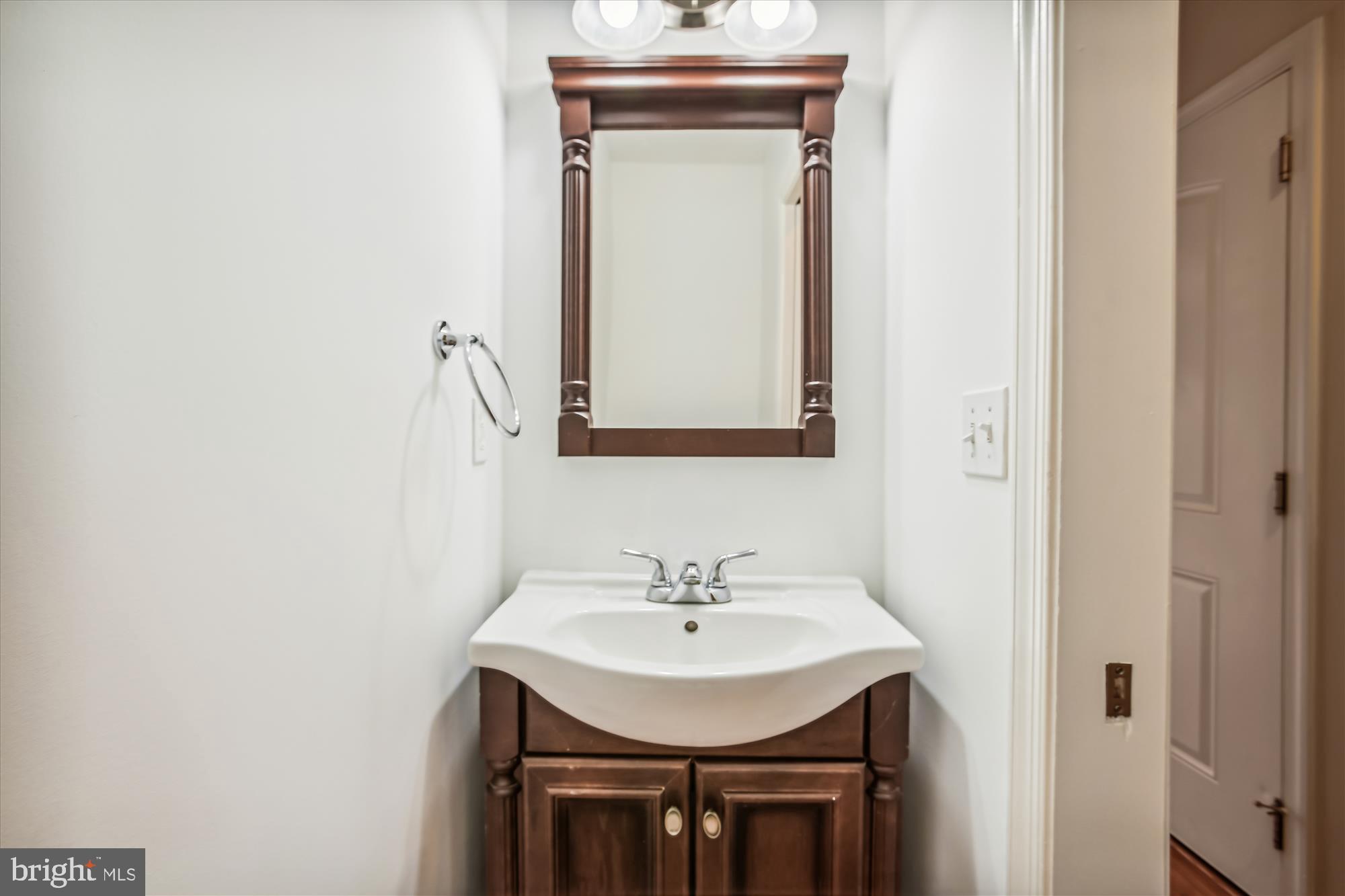 922 Madison Street Northwest, Unit 201 Washington, DC 20011 - Photo 20 of 34 a bathroom with a sink and a mirror