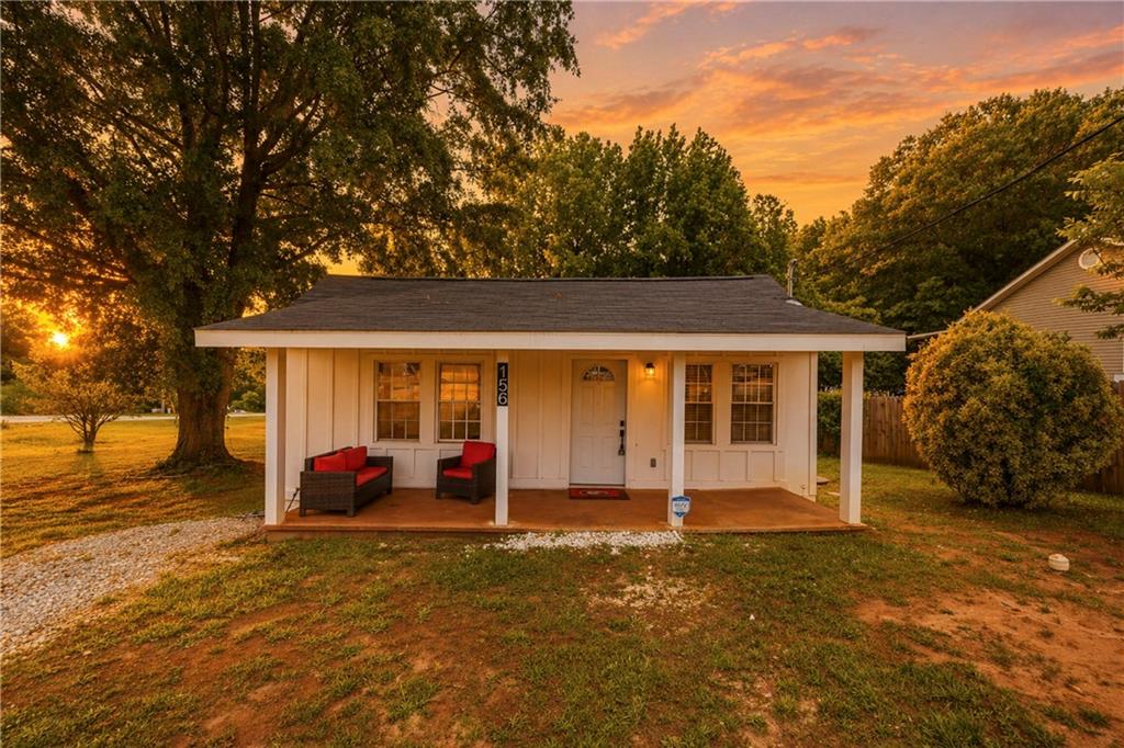 156 Pine Avenue Commerce, GA 30529 - Photo 1 of 35 a view of a house with a yard