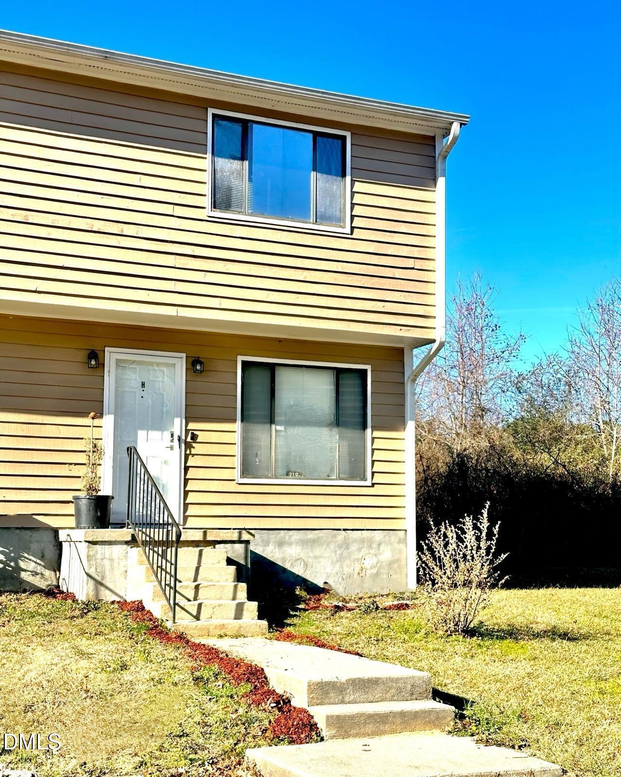 a view of a house with snow on the roof