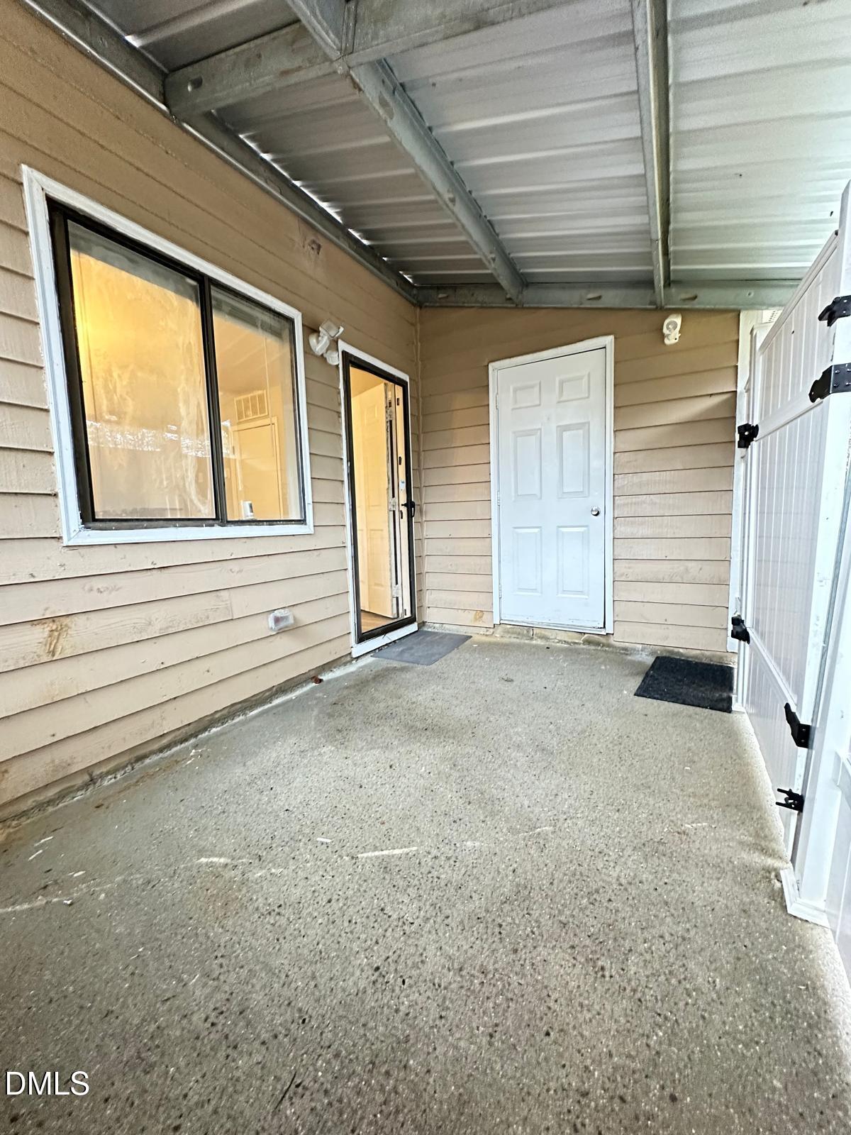 322 Junction Road, Unit 28H Durham, NC 27703 - Photo 11 of 18 a view of an empty room with a window
