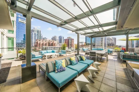 a living room with lots of furniture and a table