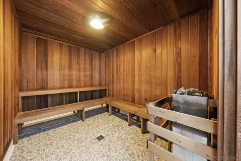 a room with bed and furniture