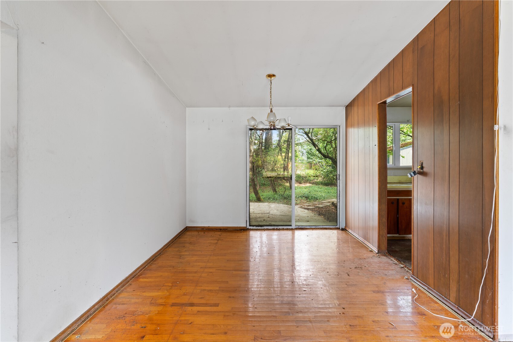 9012 Northeast 178th Street Bothell, WA 98011 - Photo 12 of 30 a view of room with window and hardwood floor