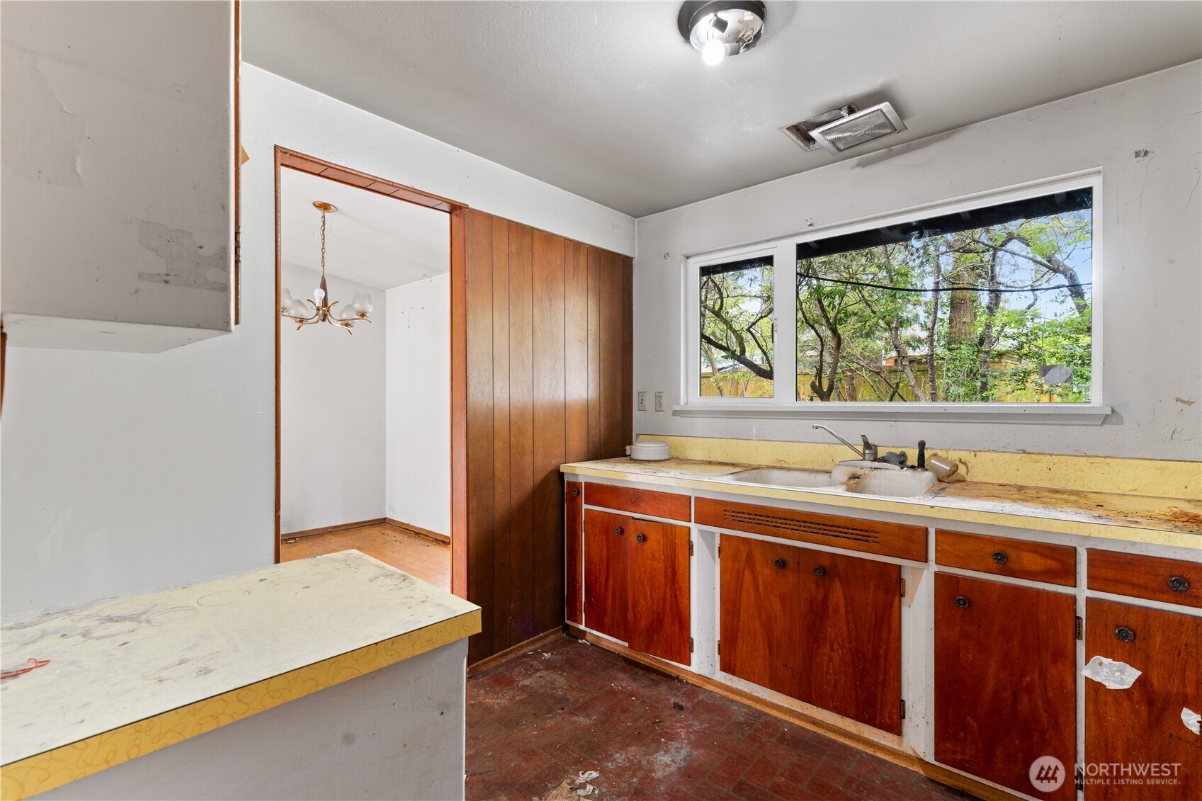 9012 Northeast 178th Street Bothell, WA 98011 - Photo 20 of 30 a view of a kitchen with a stove and a window