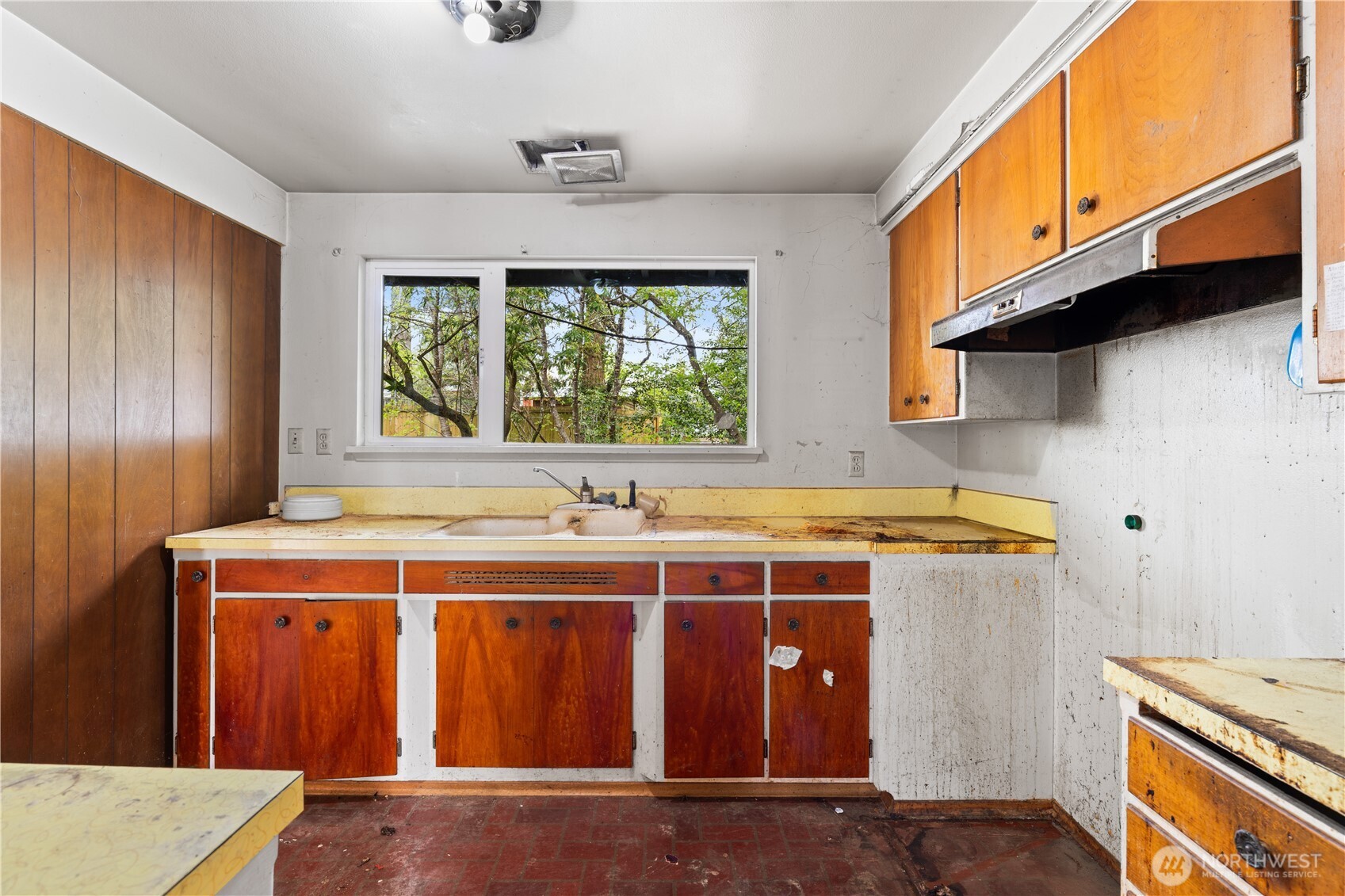 9012 Northeast 178th Street Bothell, WA 98011 - Photo 21 of 30 a kitchen with a stove and a microwave