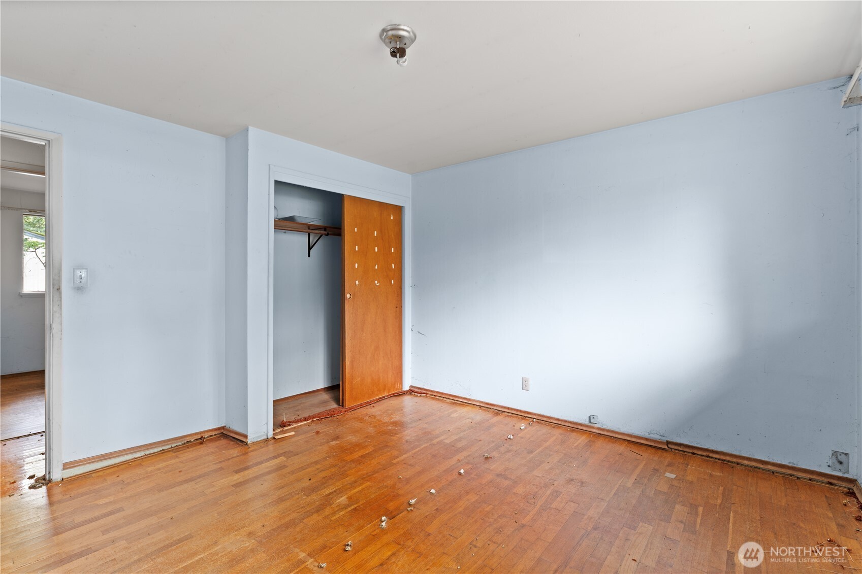 9012 Northeast 178th Street Bothell, WA 98011 - Photo 29 of 30 an empty room with wooden floor and closet