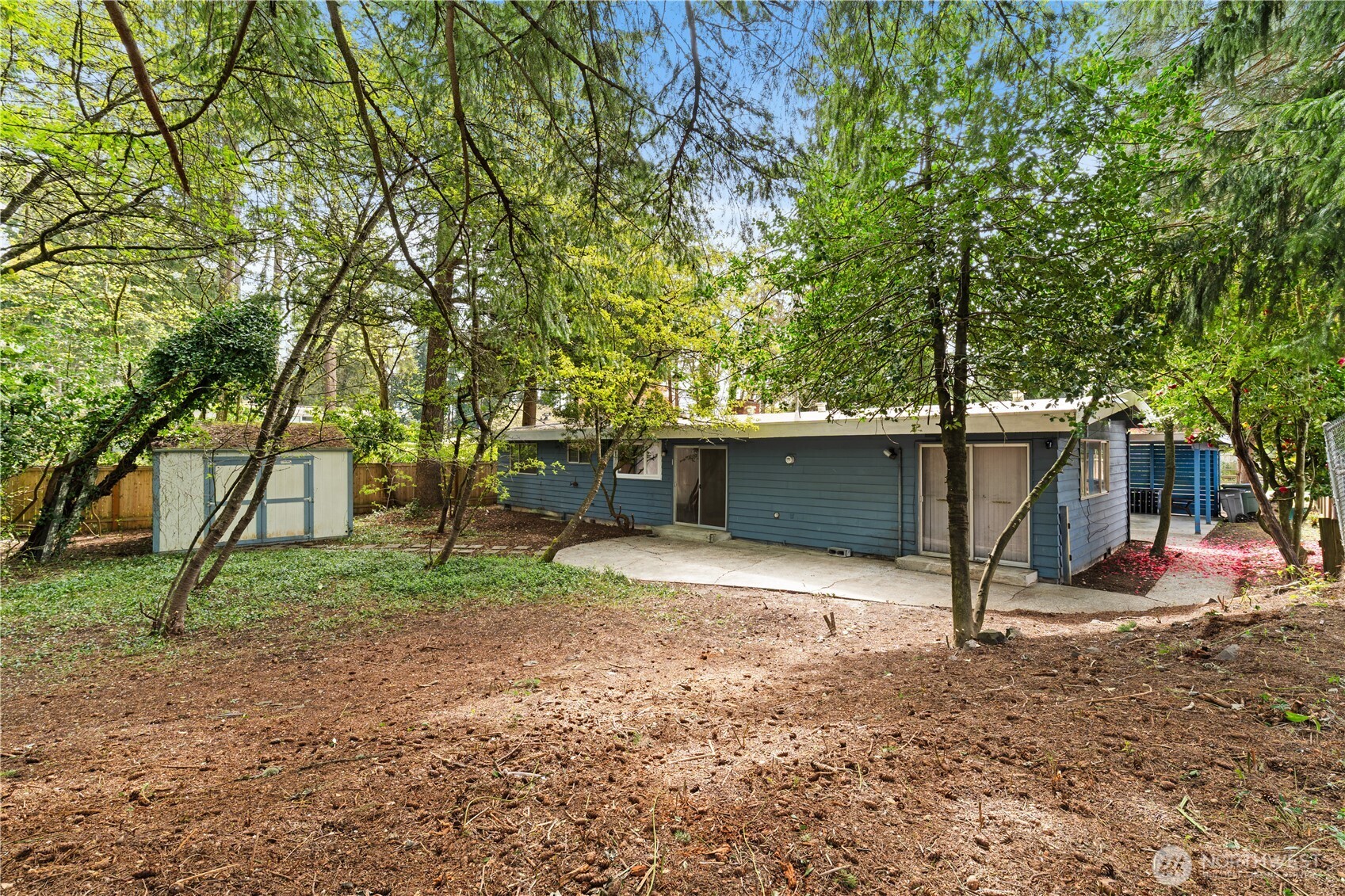 9012 Northeast 178th Street Bothell, WA 98011 - Photo 5 of 30 a view of backyard and trees