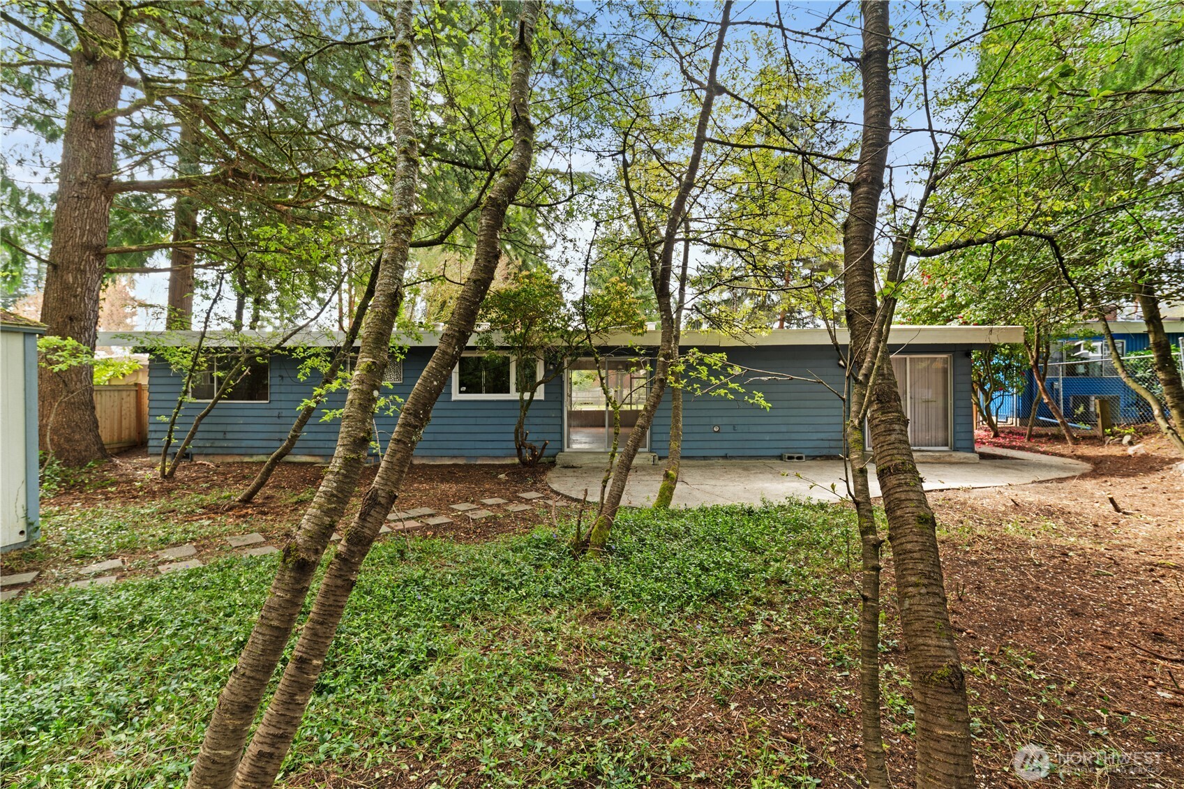 9012 Northeast 178th Street Bothell, WA 98011 - Photo 6 of 30 a backyard of a house with lots of green space
