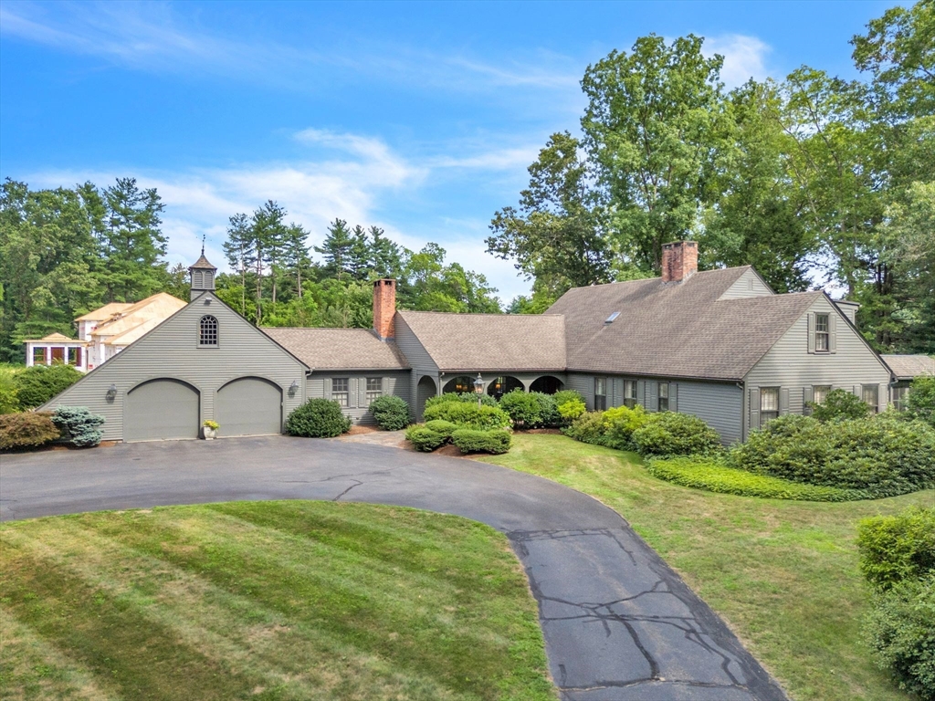 147 Shaker Road Longmeadow, MA 01106 - Photo 1 of 42 a house view with a garden space