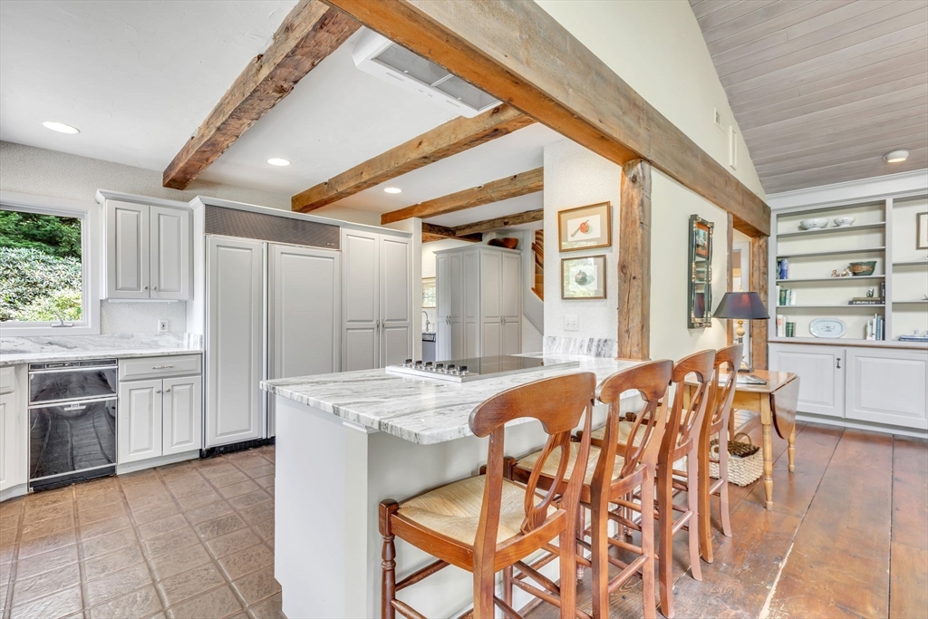 147 Shaker Road Longmeadow, MA 01106 - Photo 16 of 42 a kitchen with stainless steel appliances granite countertop a sink and cabinets