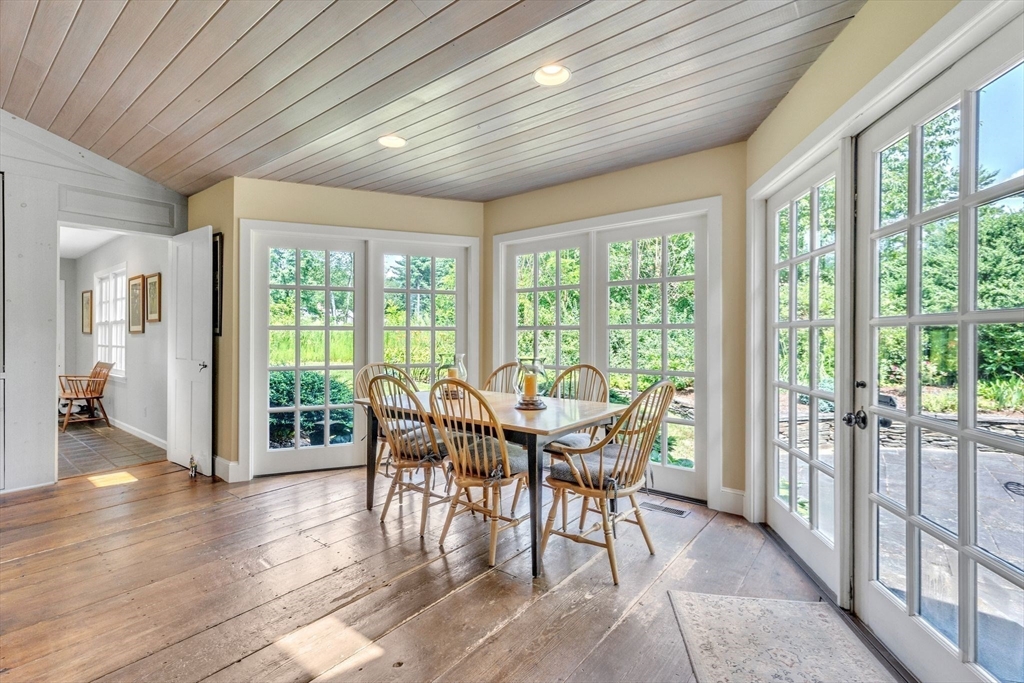 147 Shaker Road Longmeadow, MA 01106 - Photo 21 of 42 a view of a dining room with furniture window and wooden floor