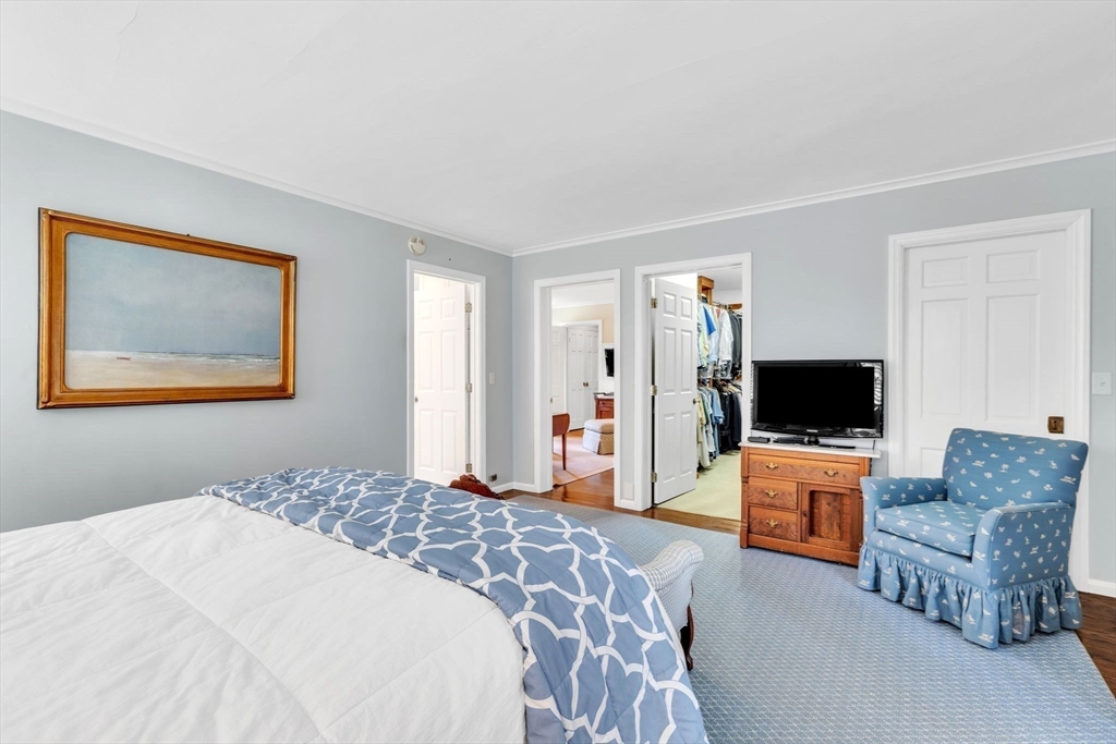 147 Shaker Road Longmeadow, MA 01106 - Photo 26 of 42 a bedroom with a bed and a couch