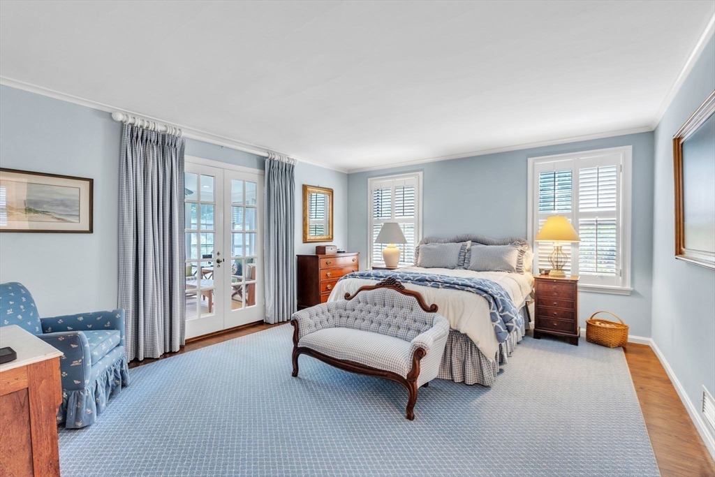 147 Shaker Road Longmeadow, MA 01106 - Photo 27 of 42 a spacious bedroom with a bed and walk in closet