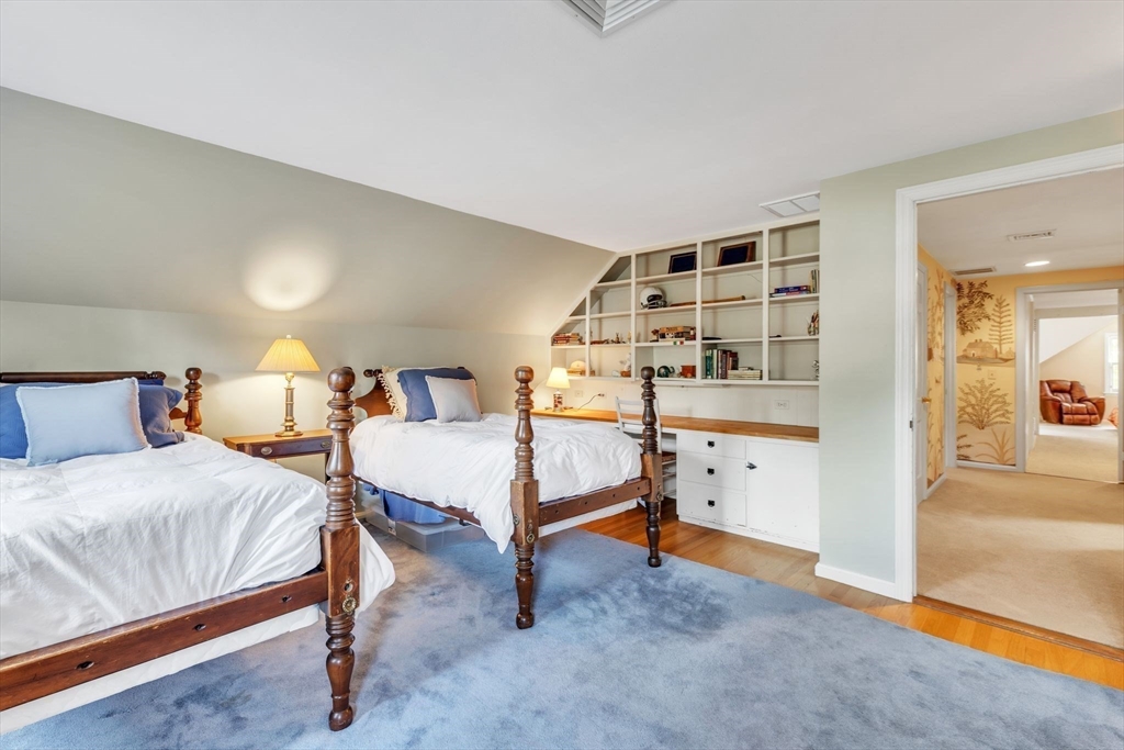 147 Shaker Road Longmeadow, MA 01106 - Photo 34 of 42 a bedroom with a bed and lamp