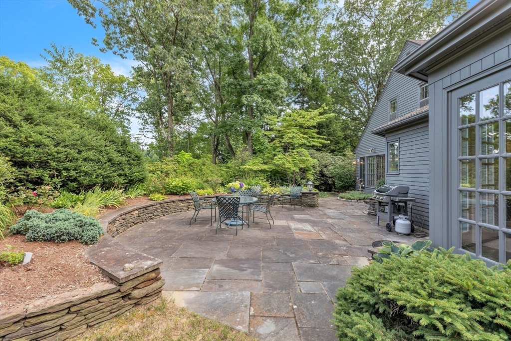 147 Shaker Road Longmeadow, MA 01106 - Photo 39 of 42 a view of backyard with outdoor seating and plants