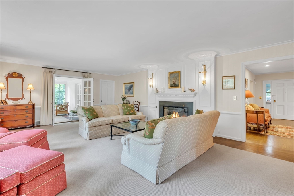 147 Shaker Road Longmeadow, MA 01106 - Photo 4 of 42 a living room with furniture and a fireplace