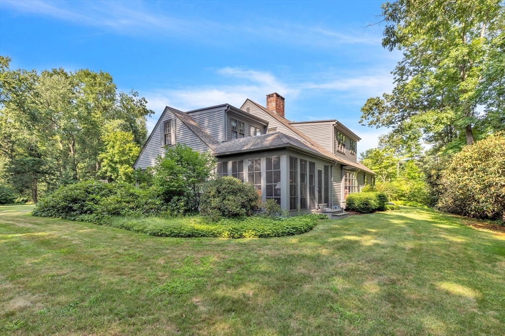 147 Shaker Road Longmeadow, MA 01106 - Photo 41 of 42 a front view of a house with a garden