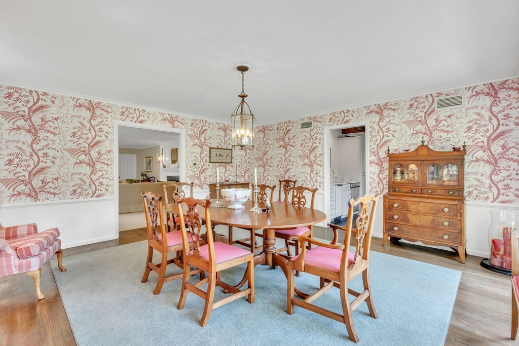 147 Shaker Road Longmeadow, MA 01106 - Photo 9 of 42 a view of a dining room with furniture and chandelier