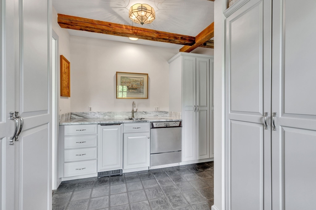 147 Shaker Road Longmeadow, MA 01106 - Photo 10 of 42 a bathroom with a granite countertop sink mirror and toilet