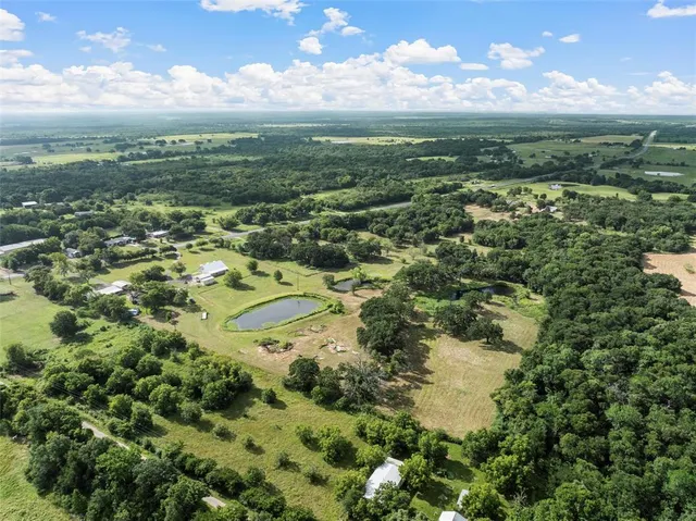 a view of a lake with a city