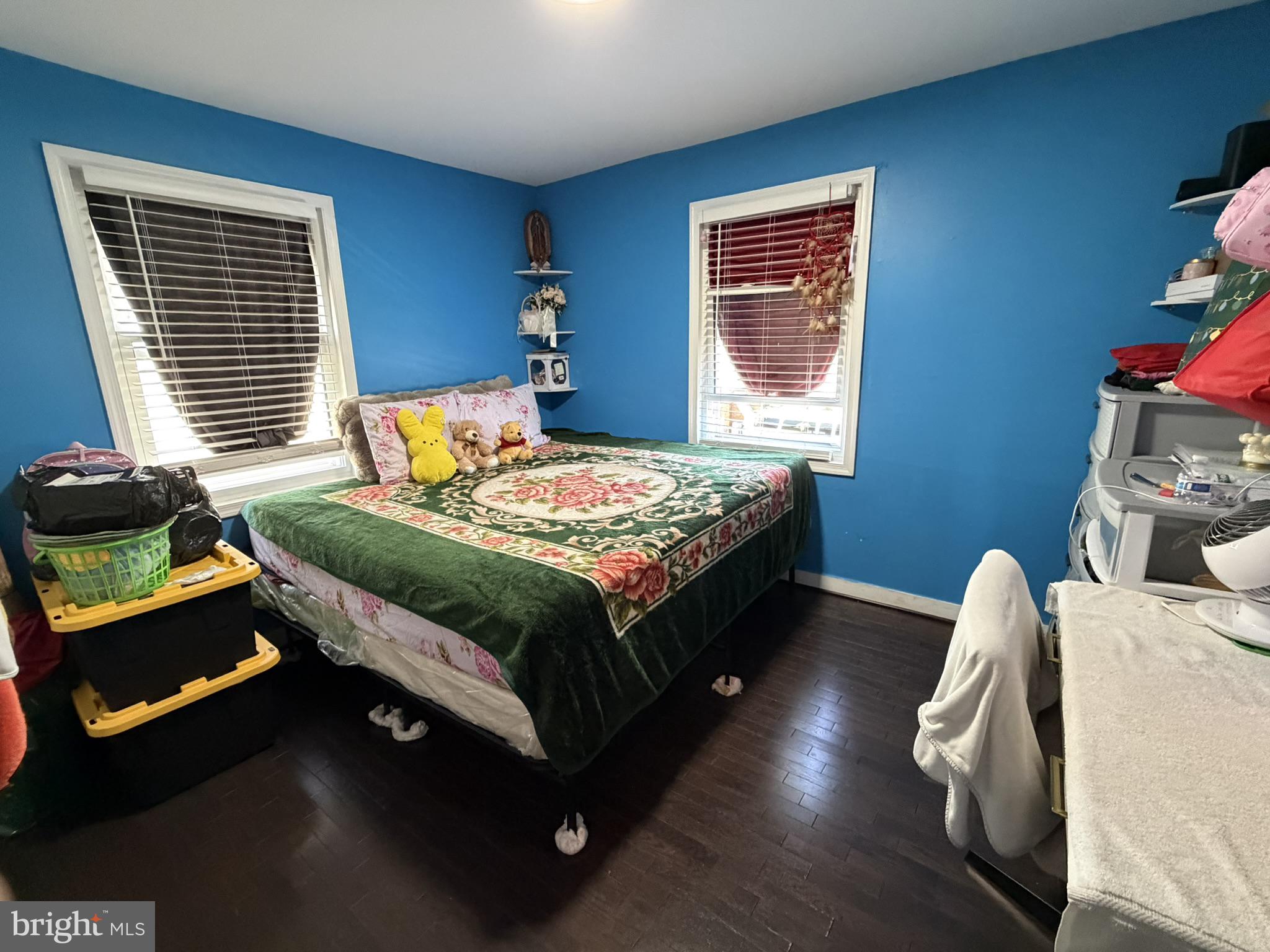 203 Sollers Point Road Dundalk, MD 21222 - Photo 11 of 16 Vibrant blue retreat with cozy charm.