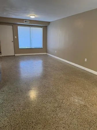 a kitchen with cabinets appliances