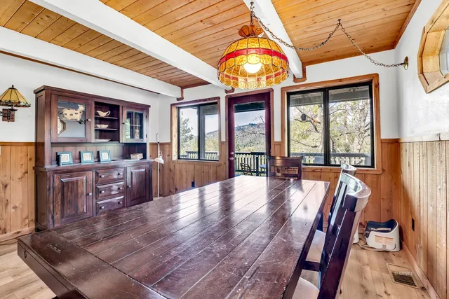 a kitchen with a refrigerator a stove and a sink