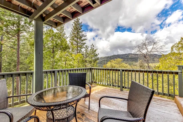 aerial view of a house with a yard