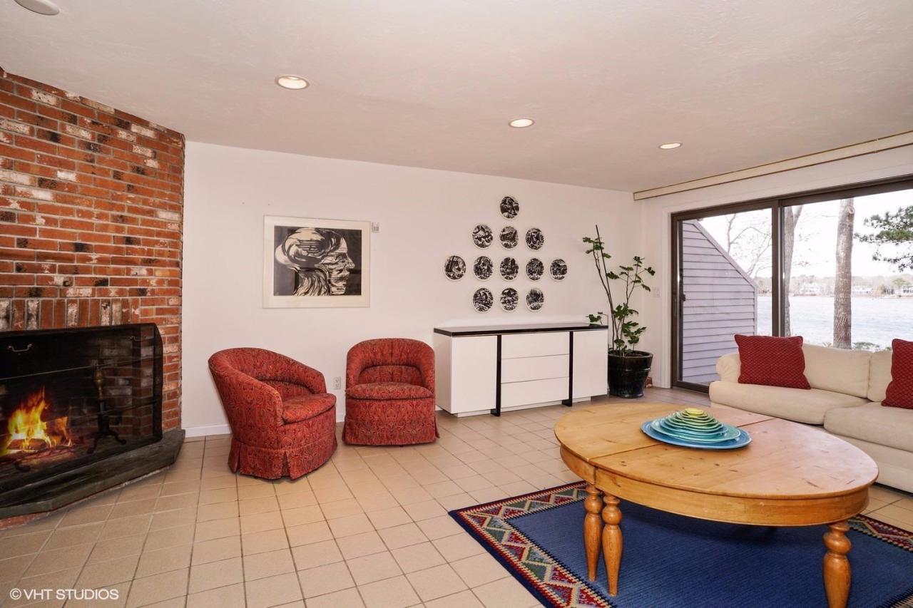381 Great Oak Road, Unit 25 Mashpee, MA 02649 - Photo 7 of 30 Waterview Living room w/wood burning FP