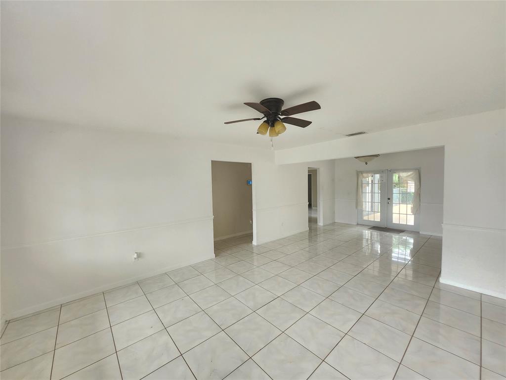 10720 Eureka Street Boca Raton, FL 33428 - Photo 5 of 18 a view of an empty room and window