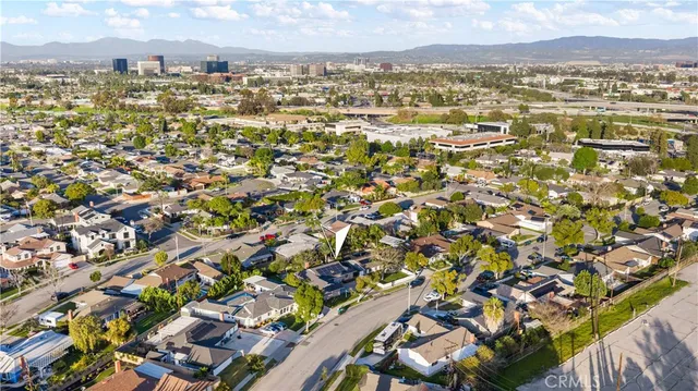 an aerial view of residential building with parking space