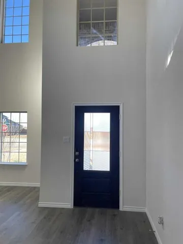 an empty room with windows