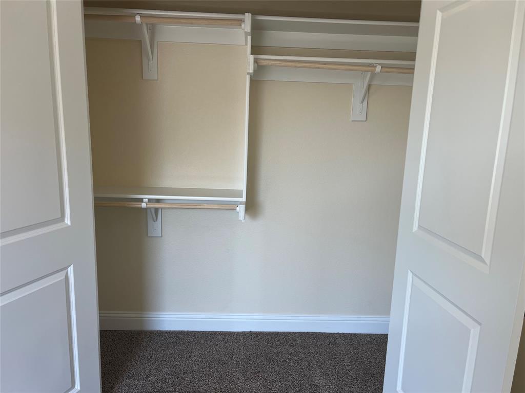 5332 Booker T Street Fort Worth, TX 76105 - Photo 15 of 18 a close view of closet